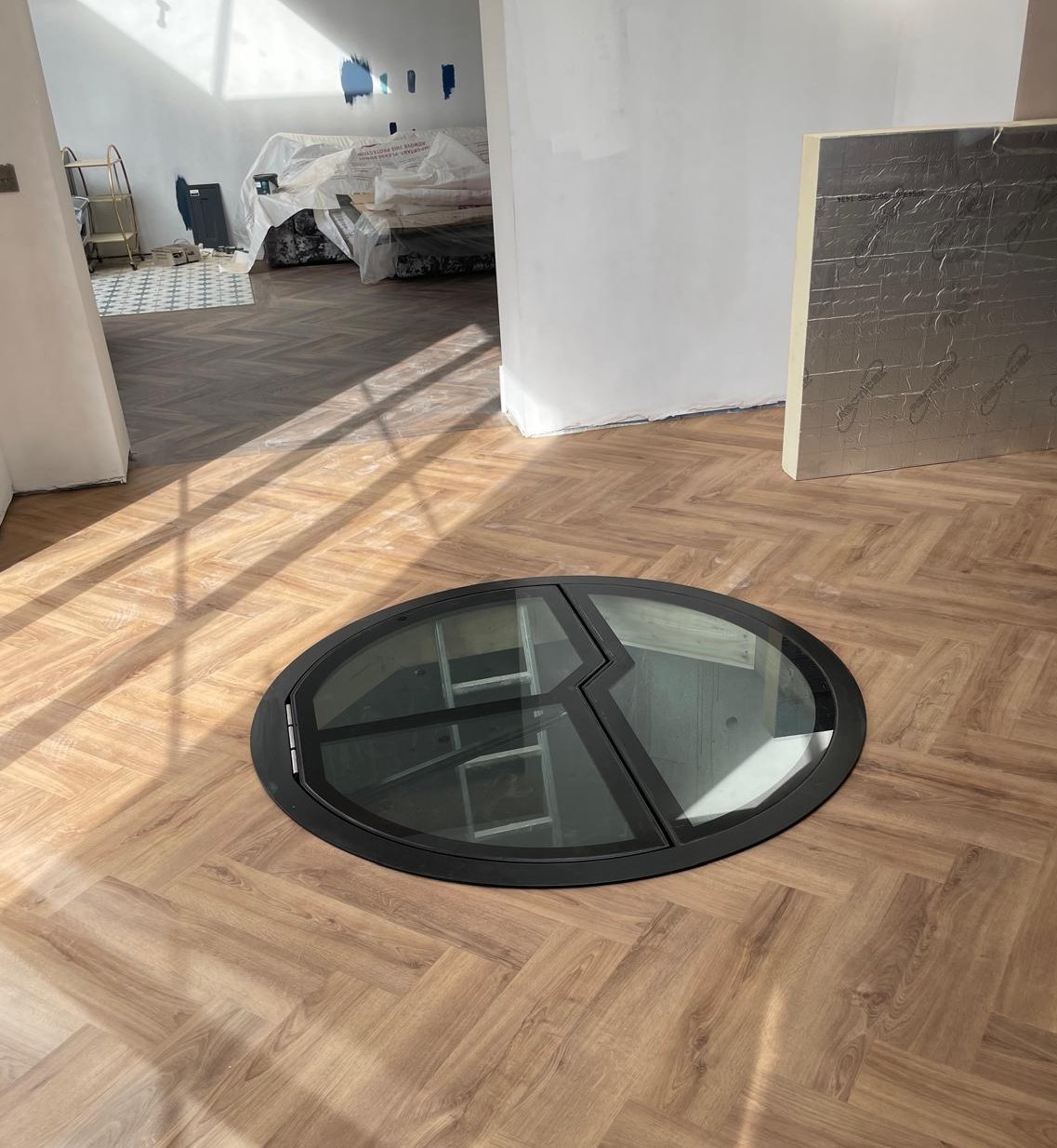 electric motorised glass floor hatch to wine cellar